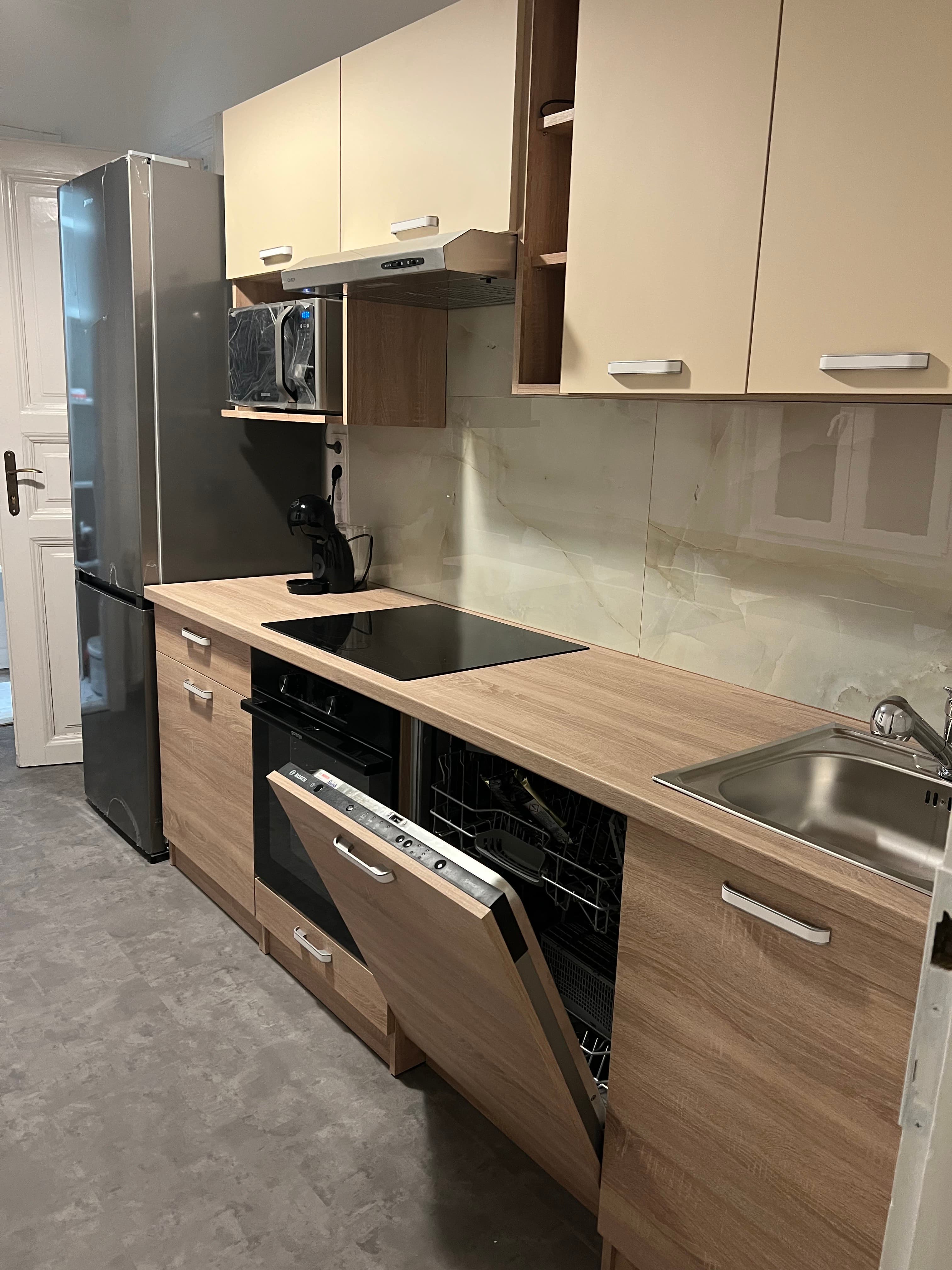 Shared kitchen overview with appliances