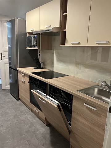 Shared kitchen overview with appliances