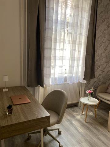 Room 1 corner with work area setup